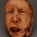 Dreamwork, Healing from shame, ceramic relief, head and face sculpture, wall hung, indoor, outdoor